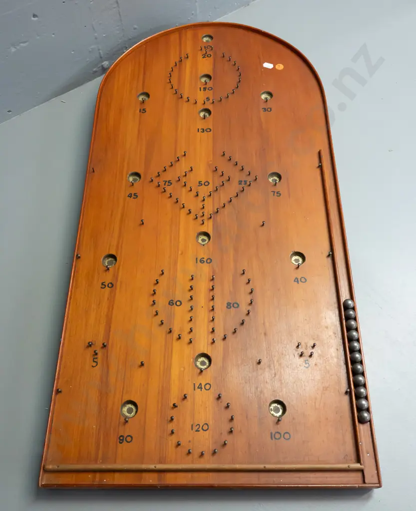 vintage NZ home made rimu bagatelle game board with 11 steel ball bearings in storage cutout inside leg Image 1++