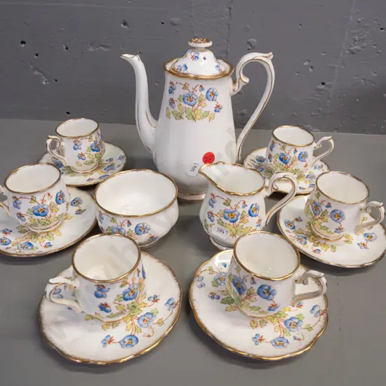 Royal Albert floral and gilt 15-piece coffee set - some staining inside some pieces.