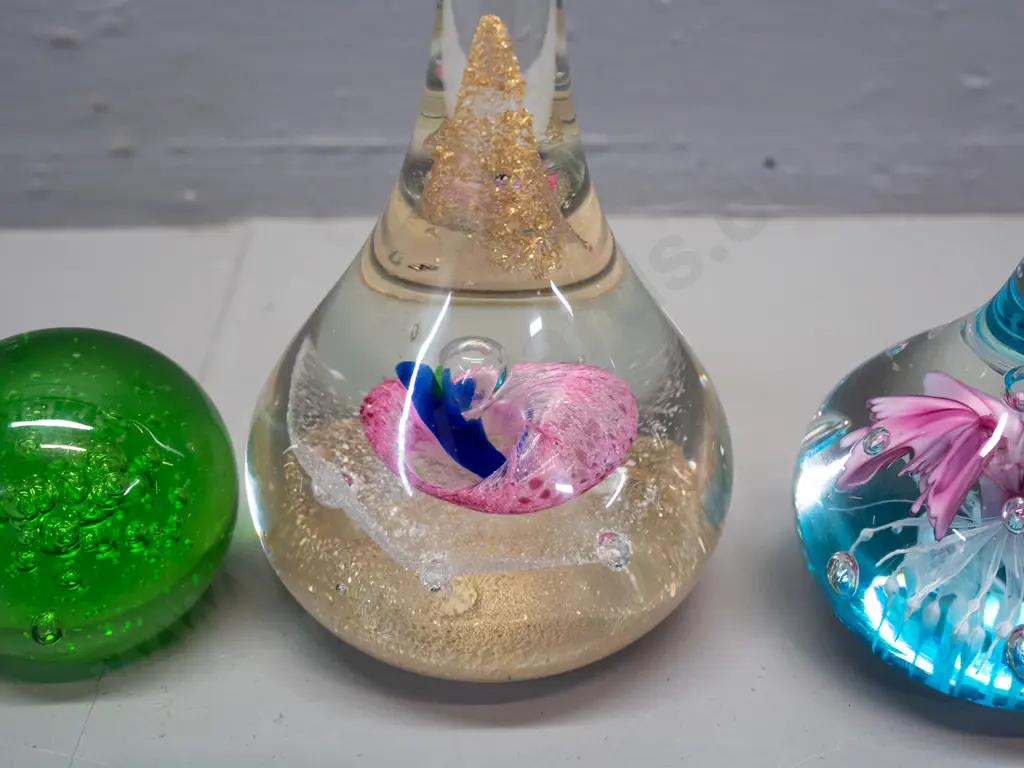 3 glass paperweights - 2 teardrop shaped with floral designs, taller is H-160, and a small Hokitika green bubble globe Image 1++