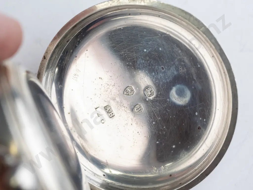 silver pocket watch with key stamped lion, anchor, b   126  AB Image 1++