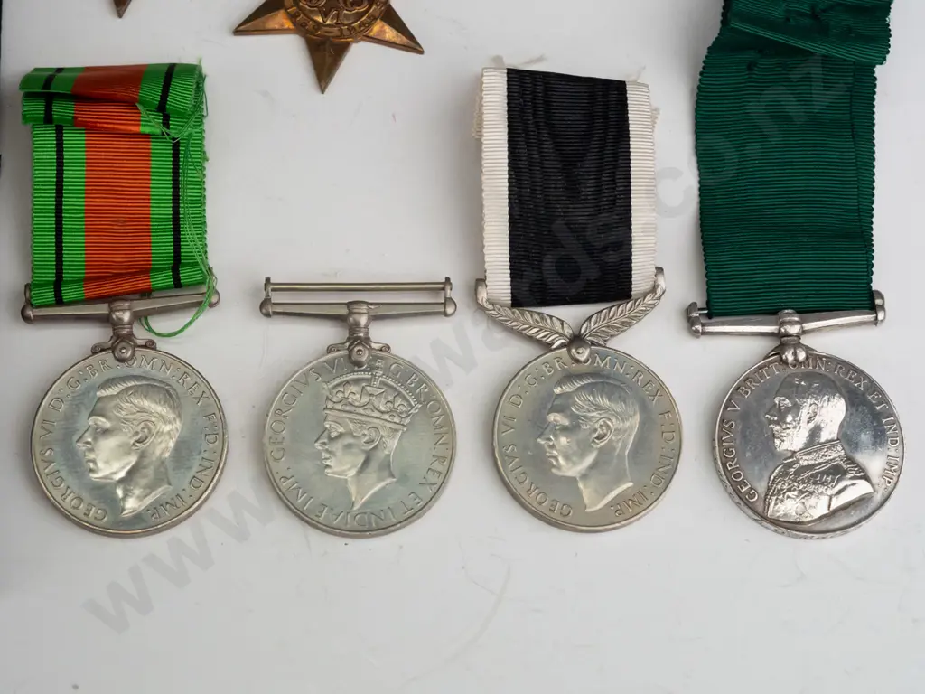 tray of assorted military service and other medals Image 1++