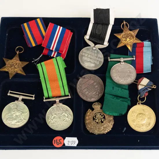 tray of assorted military service and other medals