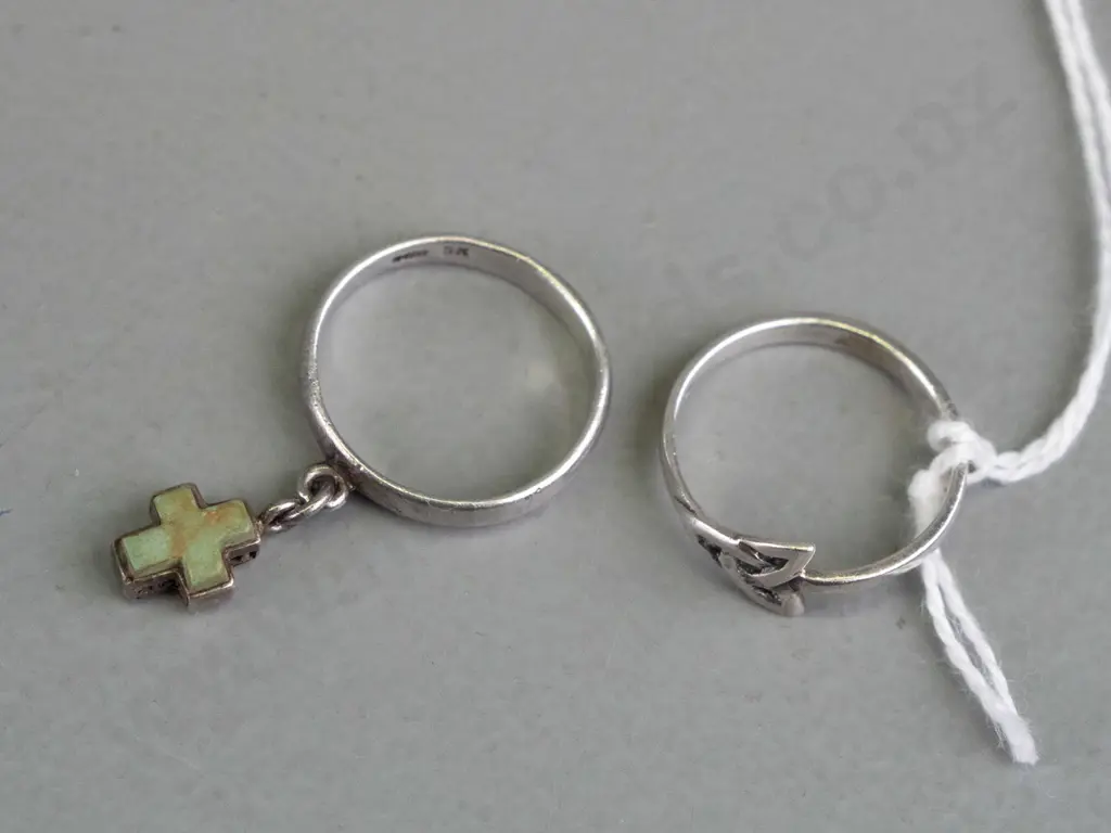 2 sterling silver rings both stamped 925 Image 1++