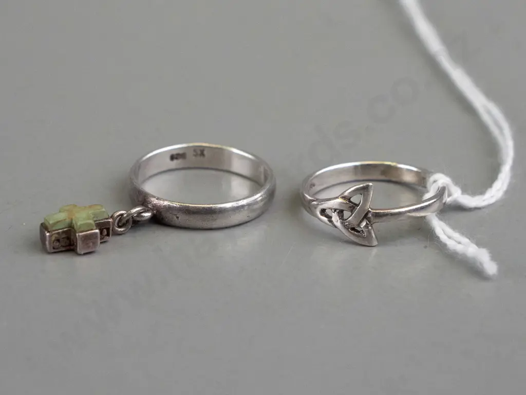 2 sterling silver rings both stamped 925 Image 1++