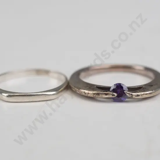 2 silver rings 1 with amethyst both stamped