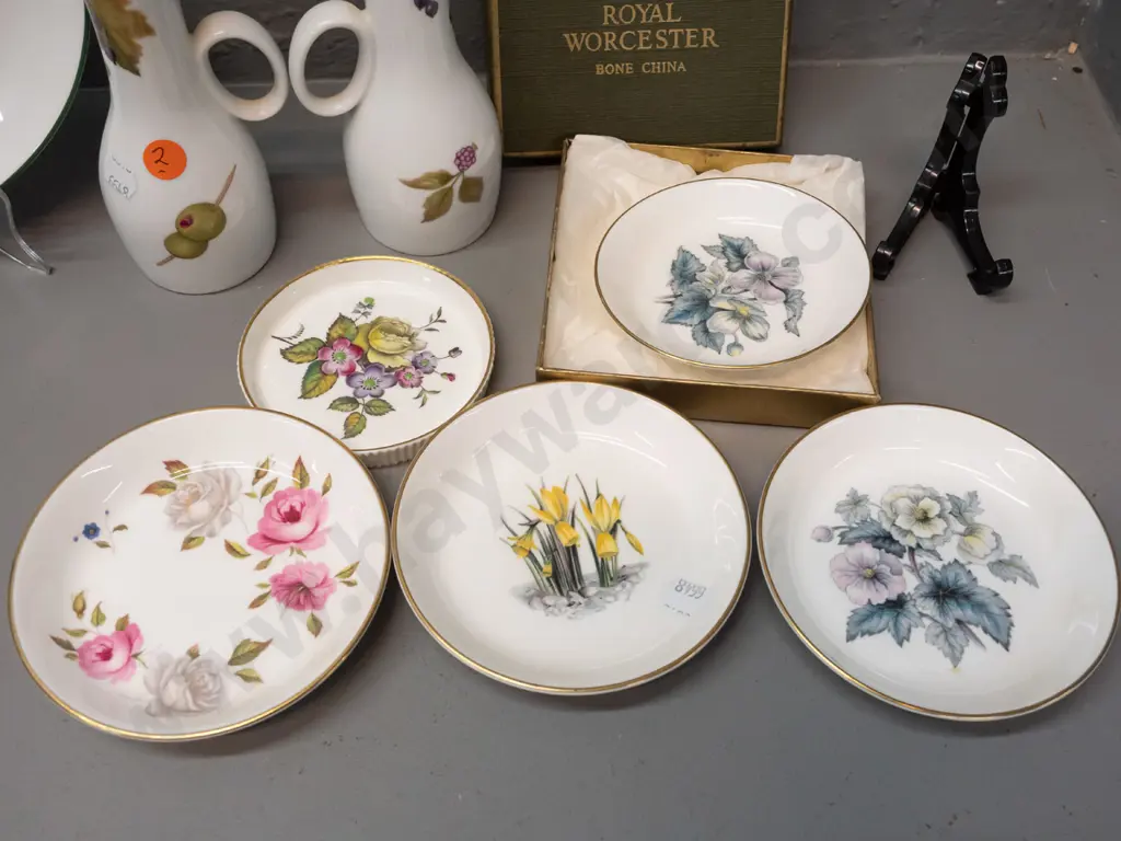 assorted Royal Worcester items - 5 pin dishes, 2 Evesham sauce/oil bottles and a "Herbs" pattern segmented serving dish. Image 1++