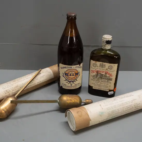 2 brass hydrometers, 1977 Deerstalkers Association Speights beer bottle and John Dewar & Sons whisky, both sealed