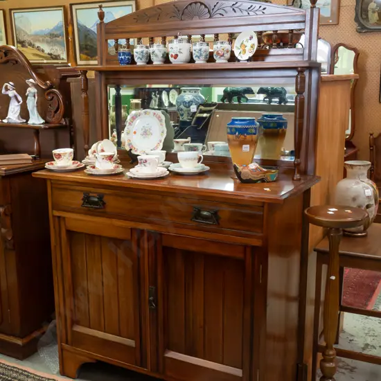 Edwardian NZ colonial rimu & beech sideboard. Carved arched top above turned gallery, full