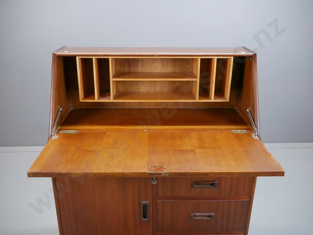 retro mahogany fold-front desk, one long drawer, cupboard door flanked by three small drawers, fold-front exposing Image 1++