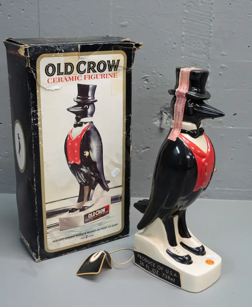 Old Crow Kentucky bourbon crow decanter with original box, seal intact, wear to box and hang tag. Decanter H-330. Image 1++