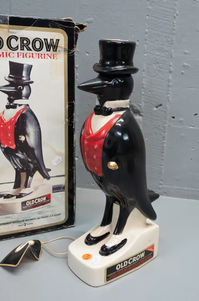 Old Crow Kentucky bourbon crow decanter with original box, seal intact, wear to box and hang tag. Decanter H-330. Image 1++