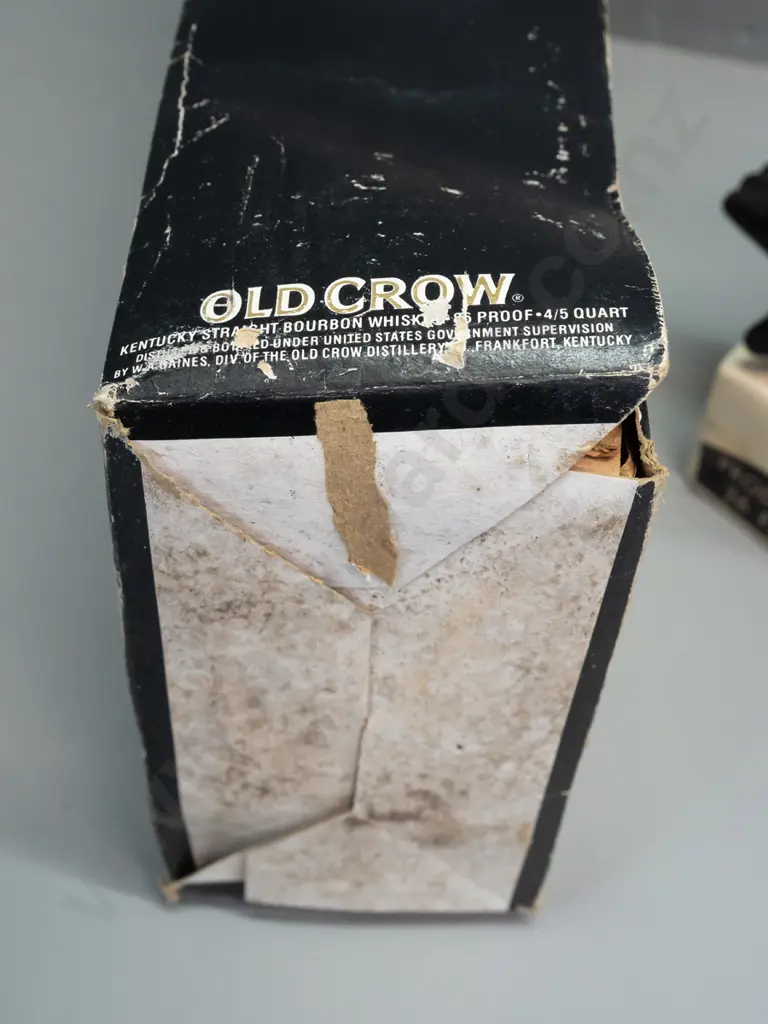 Old Crow Kentucky bourbon crow decanter with original box, seal intact, wear to box and hang tag. Decanter H-330. Image 1++