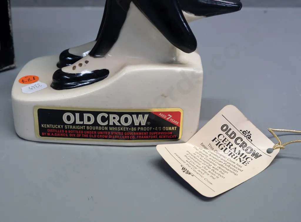 Old Crow Kentucky bourbon crow decanter with original box, seal intact, wear to box and hang tag. Decanter H-330. Image 1++