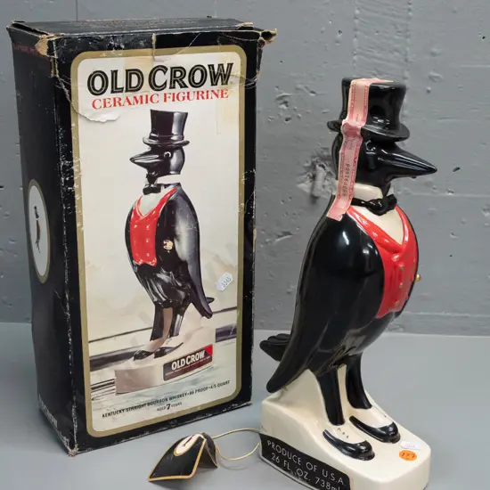 Old Crow Kentucky bourbon crow decanter with original box, seal intact, wear to box and hang tag. Decanter H-330.