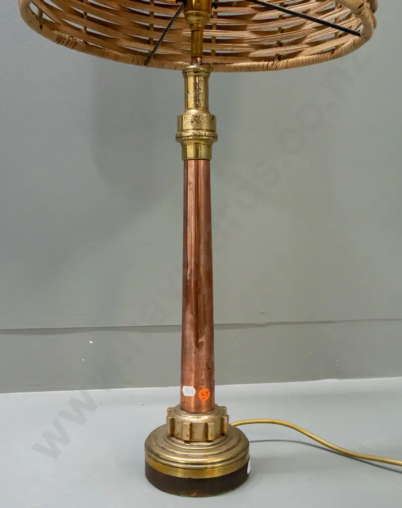 table lamp with heavy base made from industrial brass and copper parts and timber, with woven cane shade. Denting to Image 1++