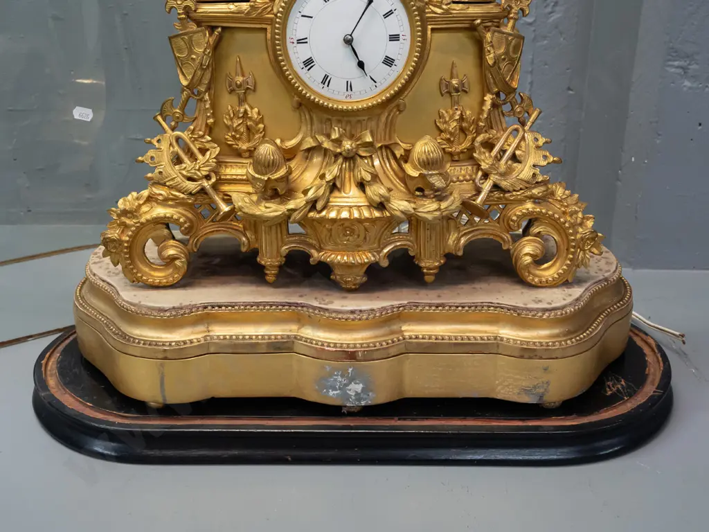 vintage ornate brass and gilded cast metal clock on gilded plaster base, on Victorian glass-domed timber base not Image 1++
