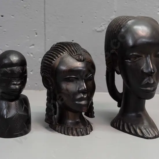 3x African carved hardwood busts, smallest has hard to read label on base, mentions Portugal, Mozambique, ebony, WWII -