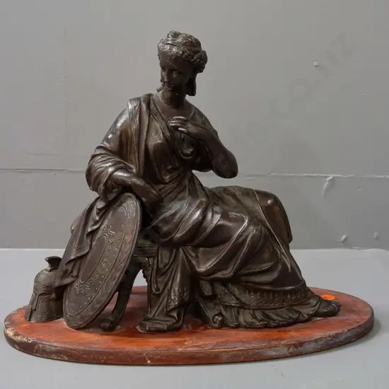 cast metal classical style figure of a seated woman with shield and helmet, on wooden base H-260 Base W-310