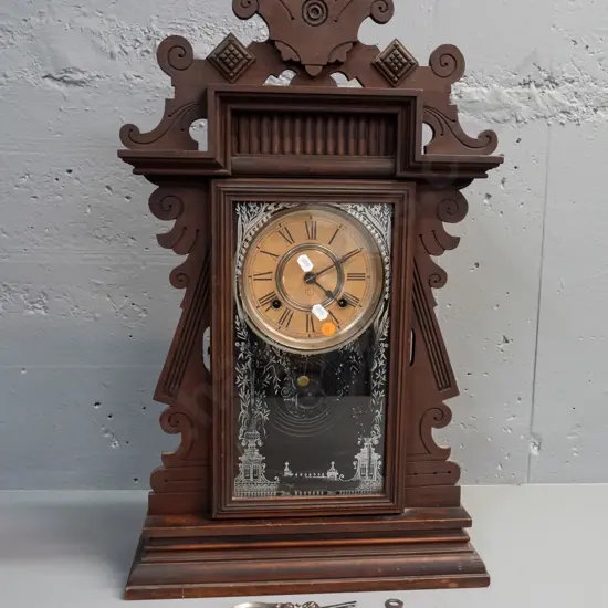 Ansonia mantle clock, carved & pierced decoration, glazed & etch glass door. H625 W380 - not going