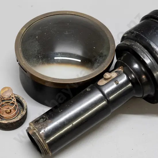 illuminated hand-held WWII RAF compass with battery compartment in handle, and a round map magnifying glass / lens