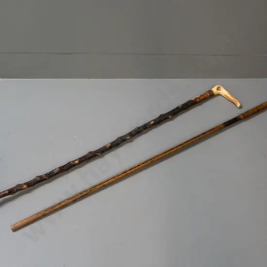 2 walking sticks - bent cane with sterling silver cap and a briar with antler handle and metal band &