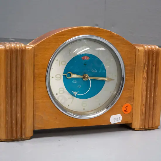 vintage alarm clock with deco style timber case, mid-century style face with clouds and jet plane 2nd hand, no maker's