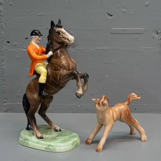 Beswick rearing horse with rider figure - repair to one foot - H245, and a small Sylvac foal with tiny fret to one ear.