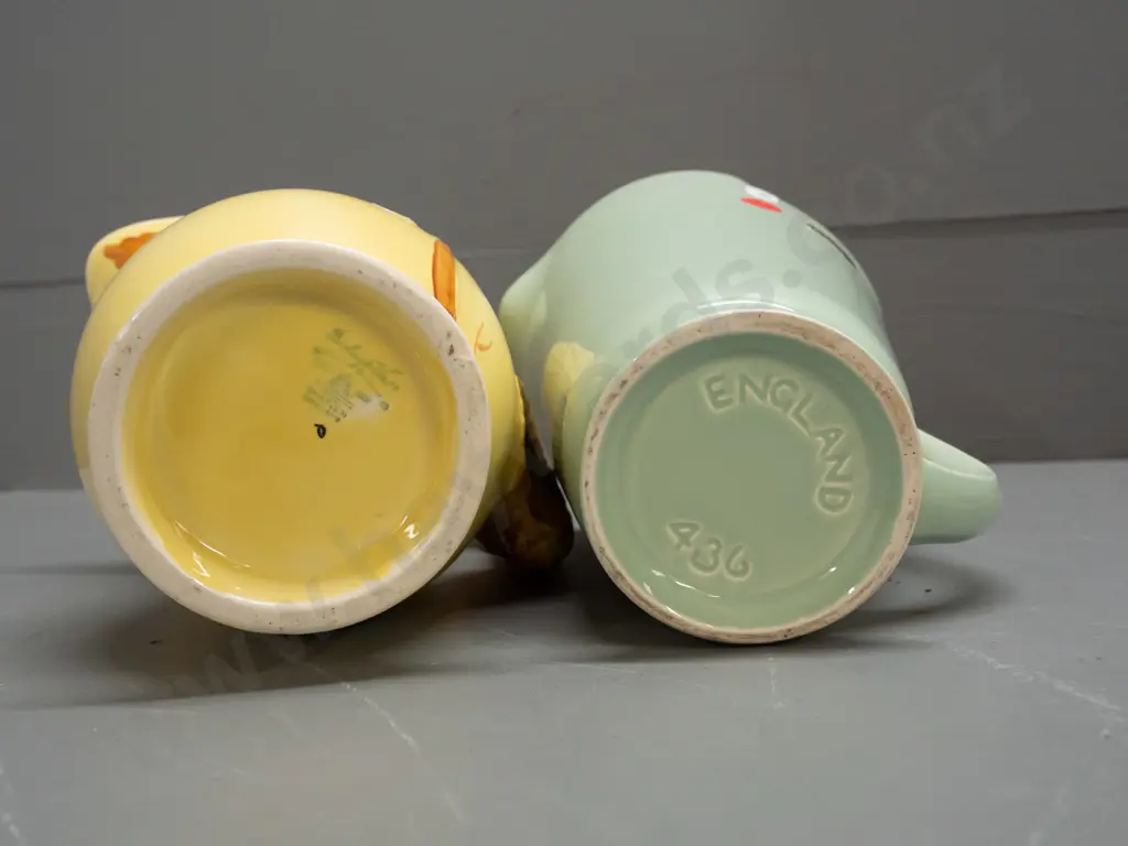 2 vintage jugs - Wade light green deco style H-180 and a Burleigh Ware with squirrel handle Image 1++