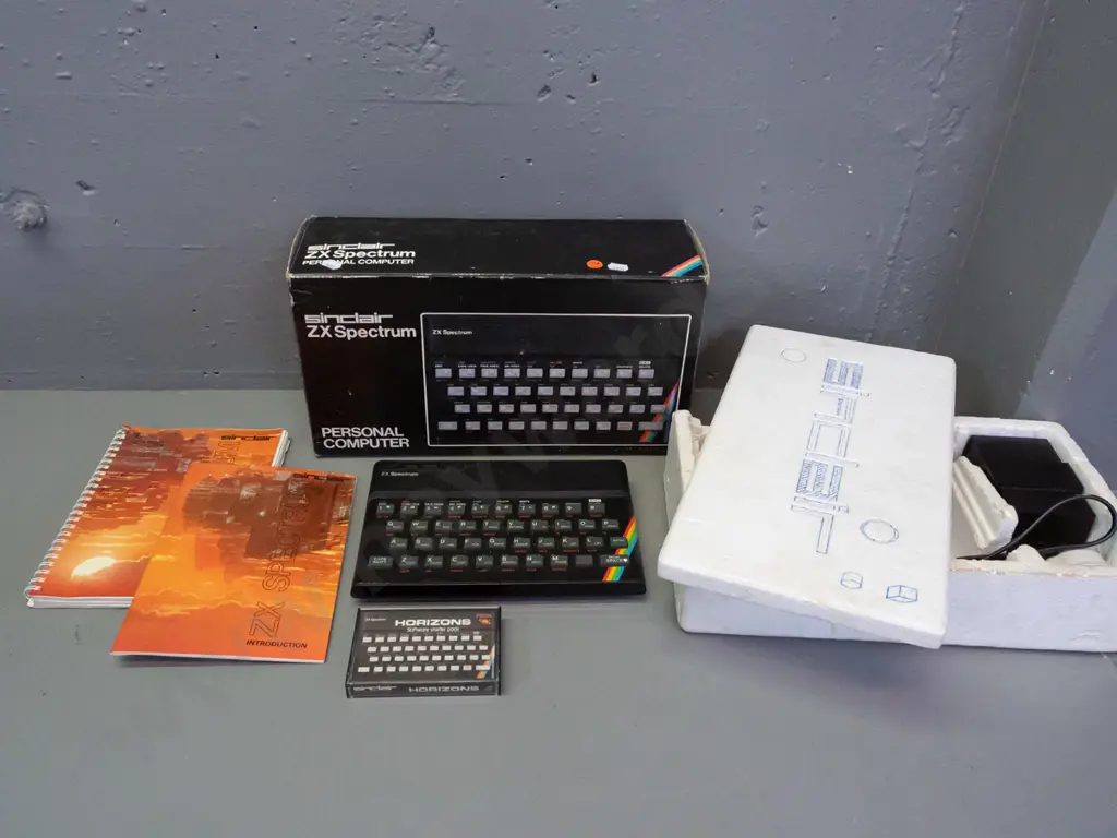 Sinclair ZX Spectrum compact computer in original box with power supply, cassette tape and manuals - untested Image 1++