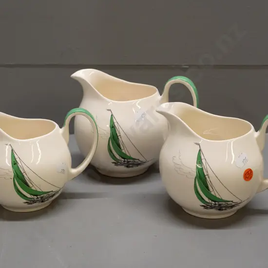 3 retro Palissy green Regatta jugs, all with some staining inside, and 2 with small chips to glaze on handles.