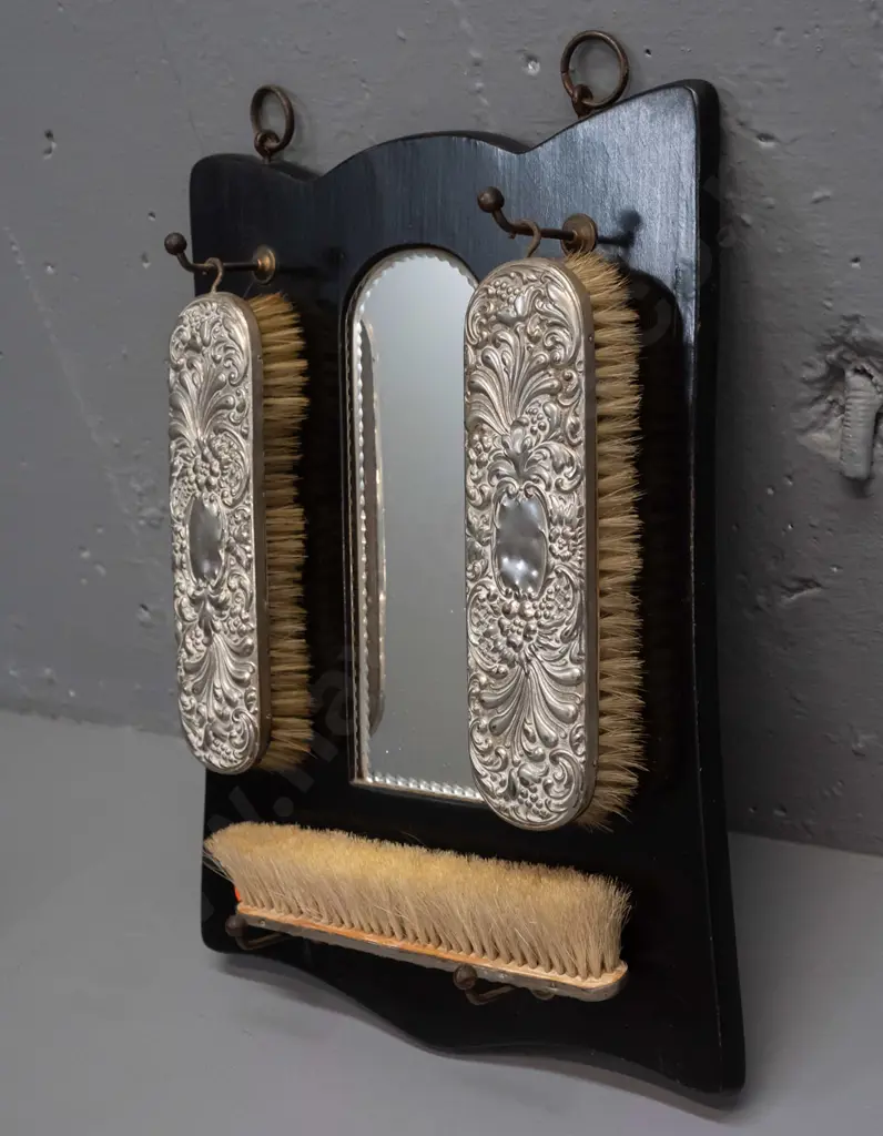 vintage wall hanging brush set with arch shaped mirror, 3 brushes with plated backing, some dents. H-320 W-220 Image 1++