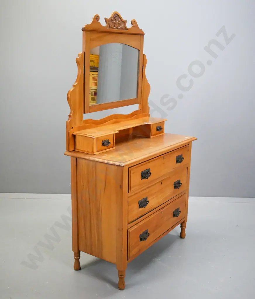 Rimu dresser, carved crest above mirror, shelf with 2 small drawers below, 3 long drawers, on short Image 1++