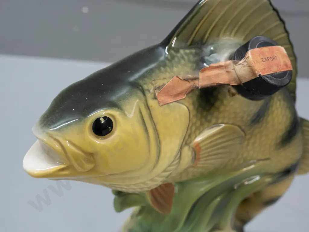 Jim Beam National Freshwater Fishing decanter, paper seal worn but intact, marked 1980 on base, label peeling away H245 Image 1++