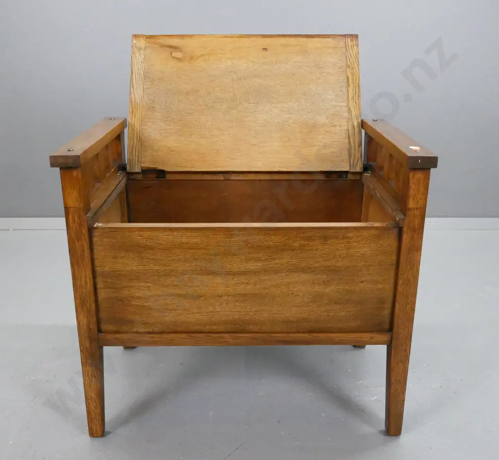 arts & craft style oak lift up lid piano stool, square tapered legs, paneled front & sides, some stains to seat top Image 1++