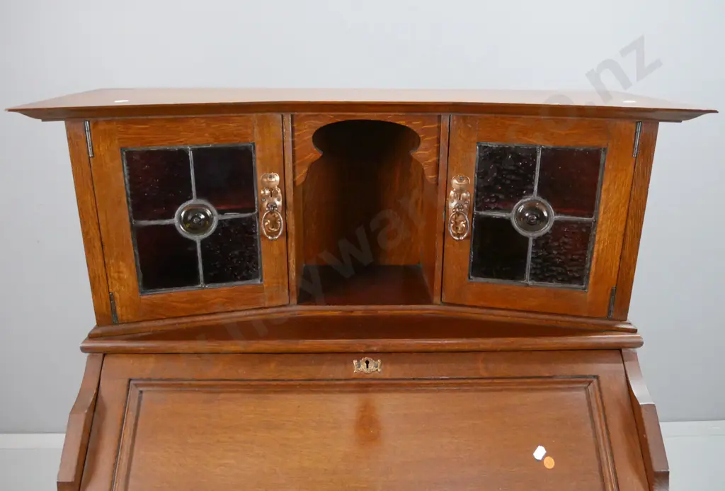 vintage arts & crafts style oak drop-front bureau with 3 lower drawers, 2 leadlight cupboard doors in top, Image 1++