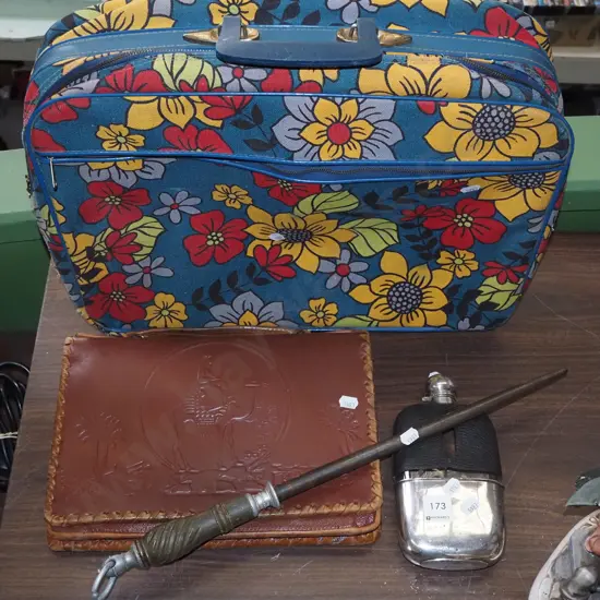 tooled leather satchel, sharpening steel, floral suitcase, hip flask