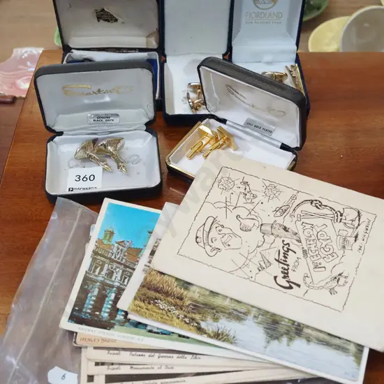 assorted cufflinks, postcards