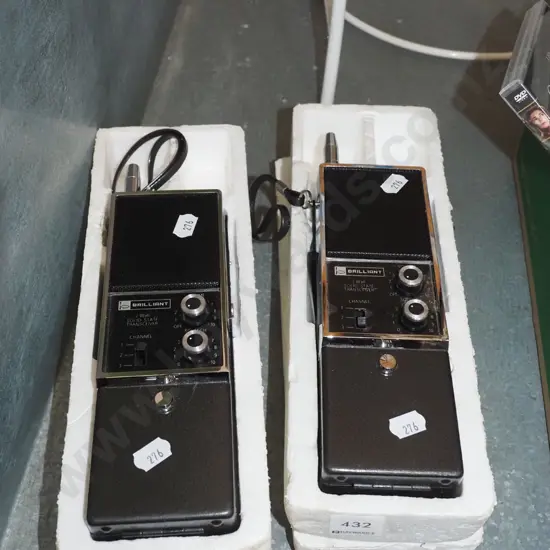 pair of hand held walkie talkie radios