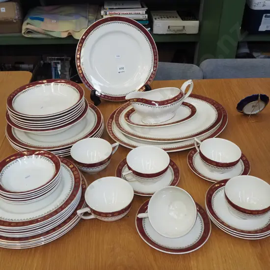 large assortment of Crown Ducal burgundy and cream dinner items