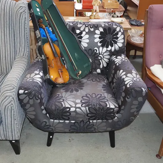 contemporary upholstered floral black and silver armchair