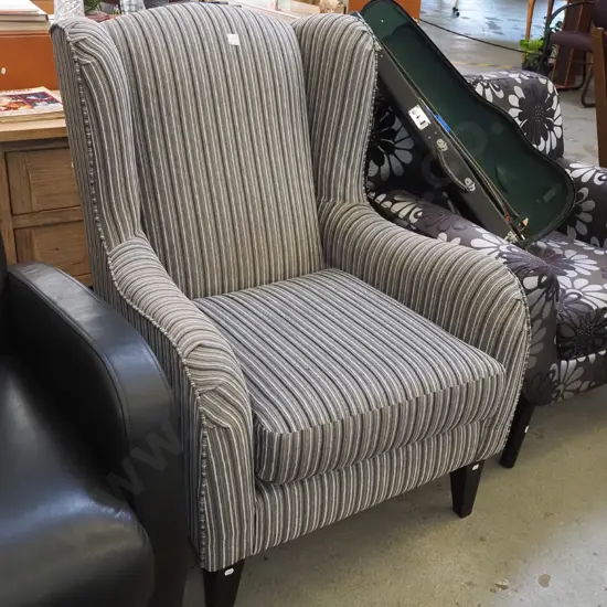 striped upholstery wingback armchair