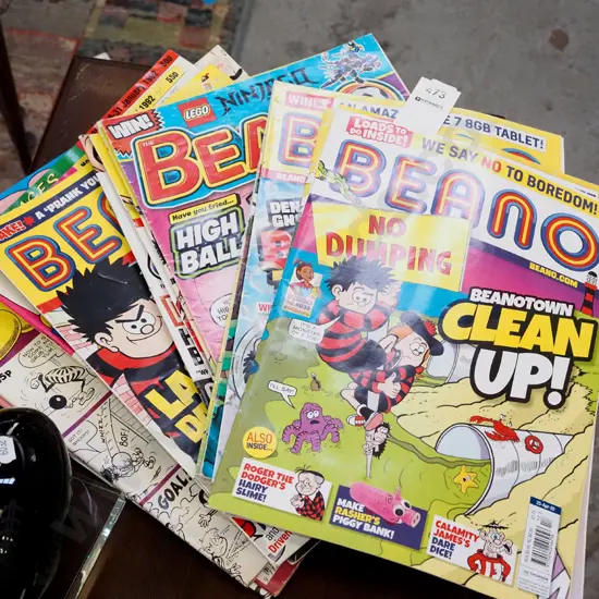 stack of English comic books