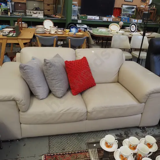 Natuzzi cream leather 2 seater settee - some scuffing and marks to leather