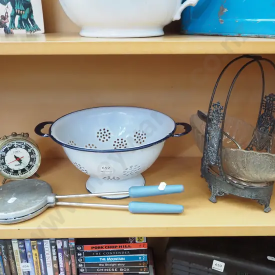 shelf; enamel colander, bedside alarm clock, plated glass serving bowl etc
