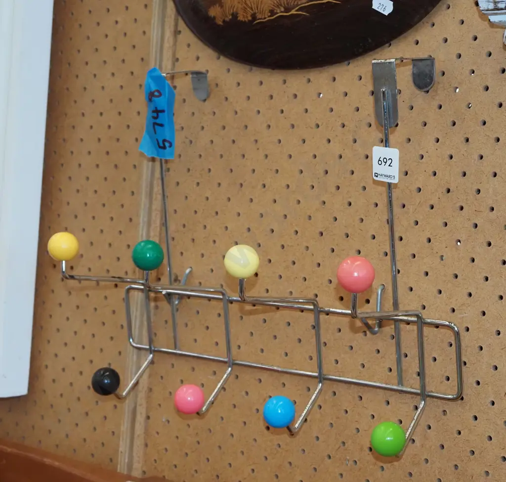 reproduction chrome and plastic coat hooks -signs of tarnishing Image 1++