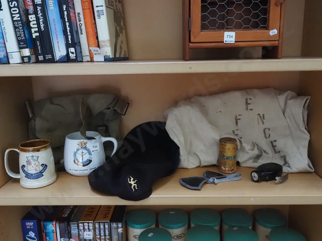 shelf; military items, berets, bag, coffee cups etc Image 1++