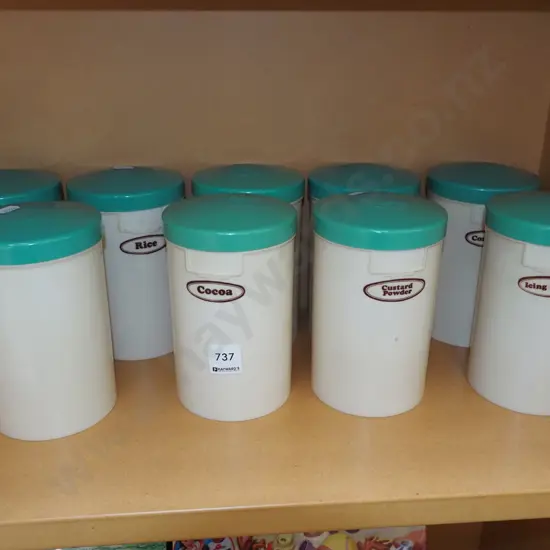 9x lidded Tiger Tea storage canisters