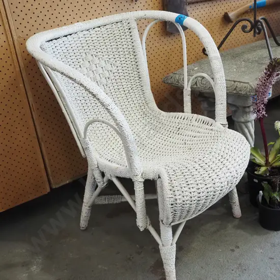 white painted cane patio chair
