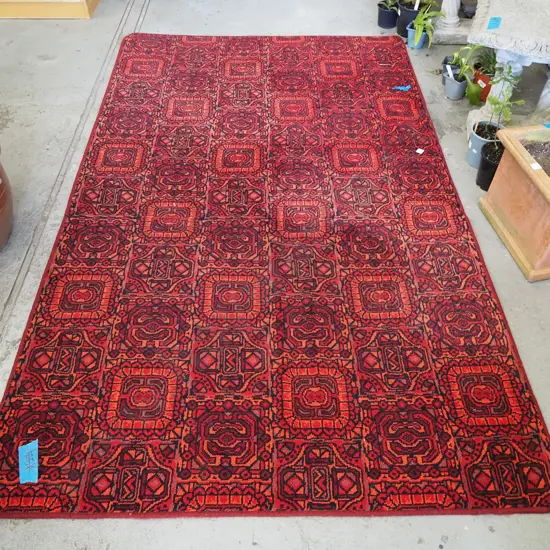 red and black edged floor mat - some separation at join and fading L2370 W1420