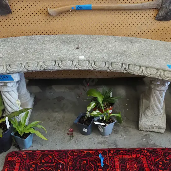 curved concrete garden bench seat